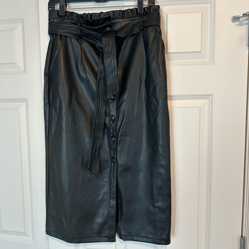 Black “leather” skirt.